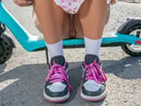 Sporty girl undresses