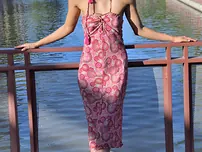 American ultra-cutie Reina poses in her long dress and takes off bare in public