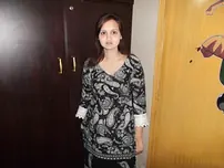 Pretty Indian gal stands nude after unclothing in her bedroom