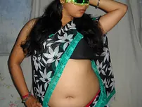Huge Indian inexperienced Velamma Bhabhi gets totally nude while wearing a mask