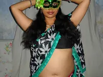 Huge Indian inexperienced Velamma Bhabhi gets totally nude while wearing a mask
