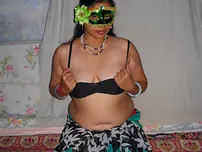 Huge Indian inexperienced Velamma Bhabhi gets totally nude while wearing a mask