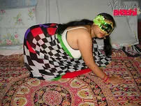 Overweight Indian dame Velamma Bhabhi showcases her funbags and cunt in a mask