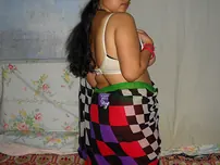 Overweight Indian dame Velamma Bhabhi showcases her funbags and cunt in a mask