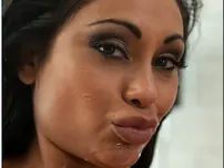 Dark-hued haired MILF Priya Rai poses with spunk over her huge hooters after a stiff-on ride