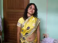 Indian wife changes apparel while pleasuring her spouse on sofa POV style