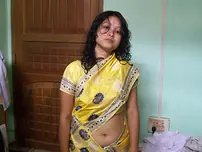 Indian wife changes apparel while pleasuring her spouse on sofa POV style