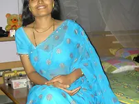 Desi housewife Aprita lets her boulder-possessor slide while posing non bare