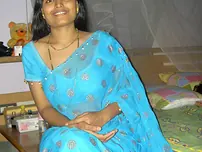 Desi housewife Aprita lets her boulder-possessor slide while posing non bare