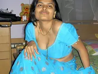 Desi housewife Aprita lets her boulder-possessor slide while posing non bare