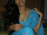 Desi housewife Aprita lets her boulder-possessor slide while posing non bare