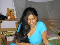 Desi housewife Aprita lets her boulder-possessor slide while posing non bare