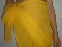 Lush Indian nymph lets out her sleekly-shaved vag and bum from a wrap