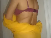 Lush Indian nymph lets out her sleekly-shaved vag and bum from a wrap