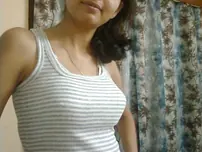 Indian woman models various items of garb and lingerie in non nude manner