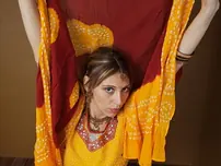 Indian fledgling works free of traditional clothing for a nude shoot