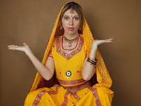 Indian fledgling works free of traditional clothing for a nude shoot