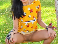 Babe Viva demonstrates her scorching coochie in public while posing in her summer dress