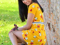 Babe Viva demonstrates her scorching coochie in public while posing in her summer dress