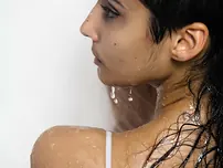 Indian solo doll peels off her wet dress to stance nude in the bath