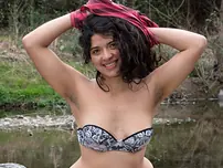 Dark-skinned-haired exotic teenage Maria F flaunts her bushy cooch & congenital jugs outdoors
