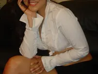 Indian beauty Sunny Leone uncovers her slick-smooth-shaven vulva and gropes it rigid