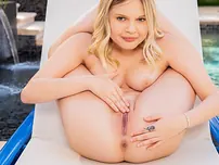 Tiny superstar Coco deepthroating Dredd's monster ebony boner by the pool