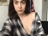 Wonderful inexperienced demonstrates her little baps & her sexy tat while nude