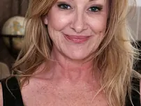 Marvelous mature light-haired Rachel Woodbury demonstrating stretch cootchie in tights