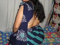 Big Indian doll Delicious decorates up her bare milk cans after getting nude in a mask