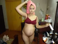 Prego Indian chick moisturizes after a douche before getting clothed