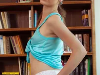 Desirable teenager Jasmina gets nude on her desk and introduces her smooth-shaven cootchie