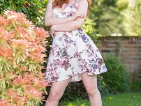 Redheaded teenager Ella Hughes demonstrates her super hot rump and boobs in a solo