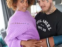 Black nubile Luna Corazon gets nude and exhibits her hefty udders and puss