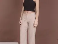 Black-haired COUGAR Lisa Glisten unveils her massive boobies and poses in high stilettos