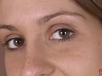 Black-haired COUGAR Lisa Glisten unveils her massive boobies and poses in high stilettos