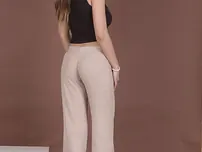 Black-haired COUGAR Lisa Glisten unveils her massive boobies and poses in high stilettos