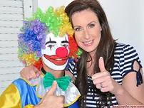 Mature chick has a sexual appointment with a clown in nylons and garters