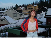 Wonderful Indian nubile poses on snow-facialed ground before going naked on a sofa