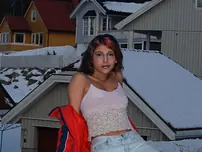 Wonderful Indian nubile poses on snow-facialed ground before going naked on a sofa