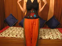 Lean Indian teenager tugs on her ponytails before getting nude nude