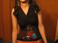 Lean Indian teenager tugs on her ponytails before getting nude nude