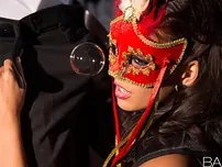 Costume play attired Janice Griffith providing oral pleasure in mask during xxx bang-out