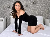 Youthful Indian damsel Zoodie unbuckles a dark-hued sundress get bare on top of her couch
