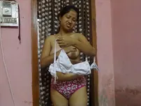 Nepalese damsel unveils innate jugs as she undresses to her underpants