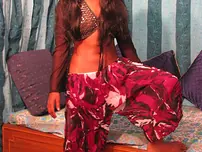 Indian nubile unsheathes her rock hard udders while getting completely bare