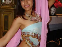 Indian teenager Laurie Vargas undresses bare before getting on top of a wood