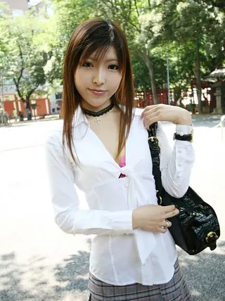 Japanese teenager Miyo flashes her funbags and panties in solo act