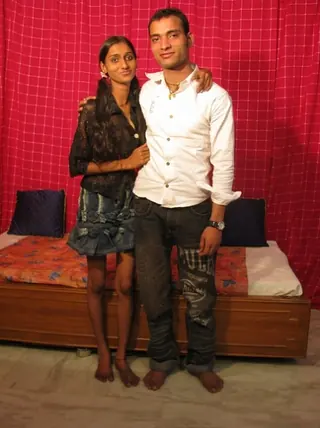 Thin Indian lady is unclothed bare before having her vulva tongued and spread