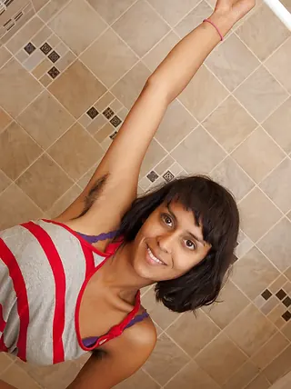 Smoking super hot Indian stunner with wooly underarms Sonya N unclothing in the tub